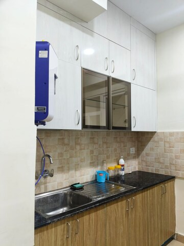 Kitchen in 4 BHK Apartment at Amrapali Crystal Homes, Sector 76 – for Rent