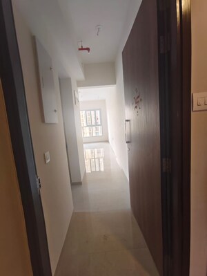 Building Lobby in 2 BHK Apartment at Piramal Vaikunth, Balkum Pada – for Rent
