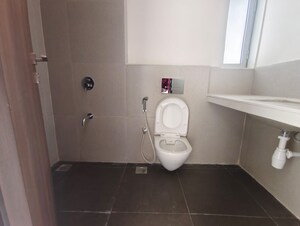 Bathroom in 2 BHK Apartment at Piramal Vaikunth, Balkum Pada – for Rent