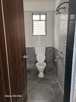 Bathroom in 1 BHK Apartment at Golden Blessings, Thergaon – for Rent