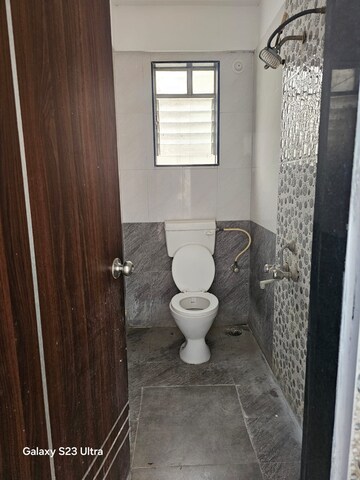 Bathroom in 1 BHK Apartment at Golden Blessings, Thergaon – for Rent
