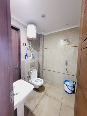 Bathroom in 3 BHK Builder Floor at Freedom Fighters Enclave – for Rent