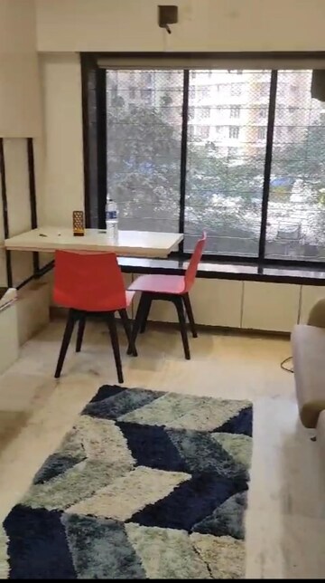 Living Room in 1 BHK Apartment at Riddhi Garden, Malad East – for Rent
