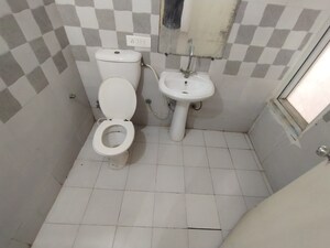 Bathroom in 2.5 BHK Apartment at Amrapali Silicon City, Sector 76 – for Sale