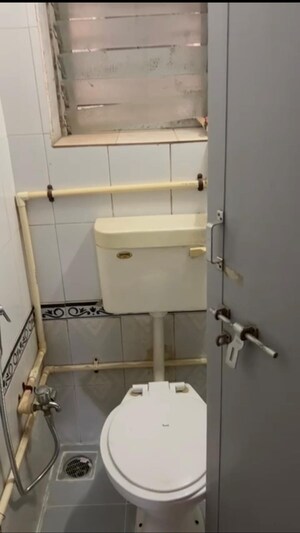 Bathroom in 2 BHK Apartment at Chitravani Chs, Malad East – for Rent