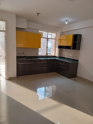 Kitchen in 2 BHK Apartment at Breez Global Heights, Sohna Sector 33 – for Rent