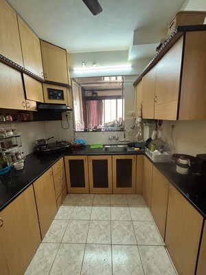Kitchen in 2 BHK Apartment at Hiranandani Gardens Glen Height, Powai – for Rent