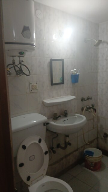 Bathroom in 3 BHK Apartment at Gail Apartments, Sector 62 – for Rent