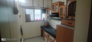 Kitchen in 2 BHK Apartment at Aditya Guruganesh Nagar Phase I, Kothrud – for Rent