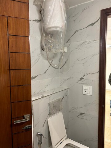 Bathroom in 3 BHK Builder Floor at Ansal Sushant Lok I, Sector 43 – for Rent