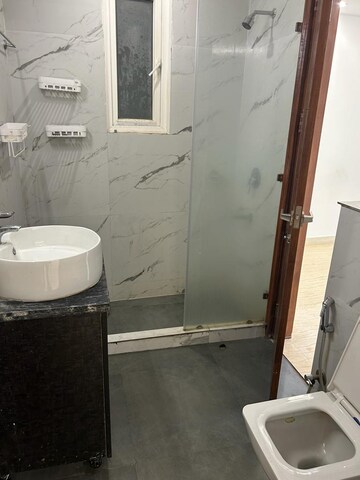 Bathroom in 3 BHK Builder Floor at Ansal Sushant Lok I, Sector 43 – for Rent