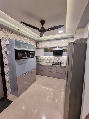 Kitchen in 2 BHK Apartment at Shapoorji Pallonji Sarova Complex, Kandivali East – for Sale