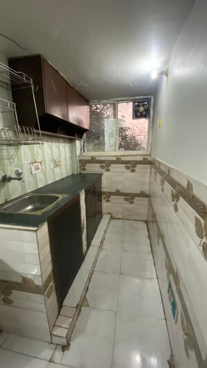 Kitchen in Studio Apartment at Ansal Sushant Estate, Sector 52 – for Rent