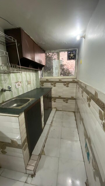 Kitchen in Studio Apartment at Ansal Sushant Estate, Sector 52 – for Rent