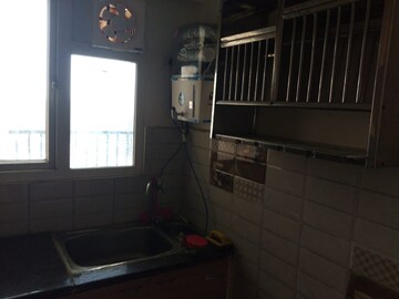 Kitchen in 2 BHK Apartment at Gaur Atulyam, Omicron I Greater Noida – for Sale