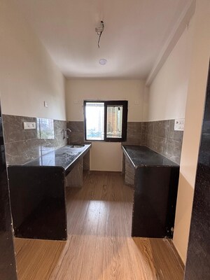 Kitchen in 2 BHK Apartment at Prarthana Rajkamal Park, Parel – for Sale