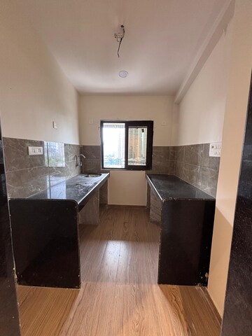 Kitchen in 2 BHK Apartment at Prarthana Rajkamal Park, Parel – for Sale