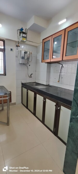 Kitchen in 1 BHK Apartment at Ajmera Odyessey Apartment, Bhakti Park – for Rent