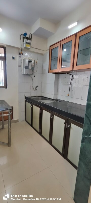 Kitchen in 1 BHK Apartment at Ajmera Odyessey Apartment, Bhakti Park – for Rent