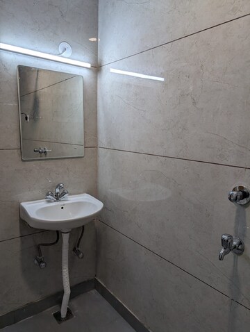 Bathroom in 3 BHK Apartment at The Apoorva Apartment, Sector 5 Dwarka – for Rent
