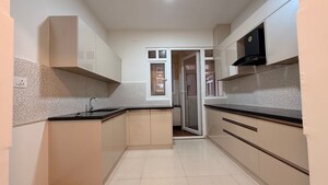 Kitchen in 3 BHK Apartment at Pashmina Waterfront, Old Madras Road – for Rent
