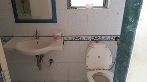 Bathroom in 1 BHK Apartment at Comet Apartment, Bhakti Park – for Rent