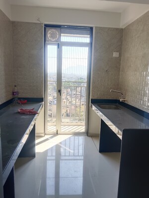 Kitchen in 2 BHK Apartment at Ajmera Crosstown One, Kalyan West – for Rent