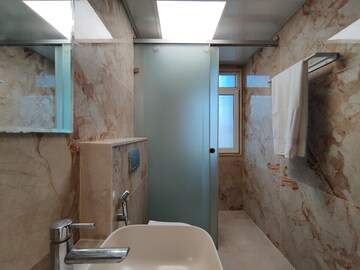 Bathroom in 4 BHK Apartment at Bhartiya Nikoo Homes Phase 2, Thanisandra Main Road – for Rent