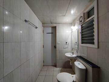 Bathroom in 3 BHK Apartment at Mantri Webcity, Hennur – for Rent
