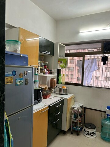 Kitchen in 1 BHK Apartment at Ajmera Odyessey Apartment, Bhakti Park – for Rent