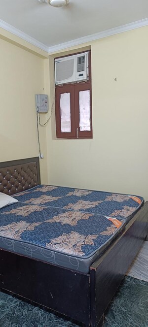 Bedroom in 2 BHK Builder Floor at Lajpat Nagar I – for Rent