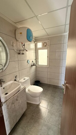 Bathroom in 3 BHK Apartment at Amrapali Golf Homes, Sector 4 Greater Noida – for Rent