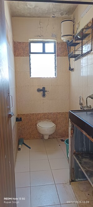 Bathroom in 2 BHK Apartment at Silver Arch Eden woods, Andheri West – for Rent