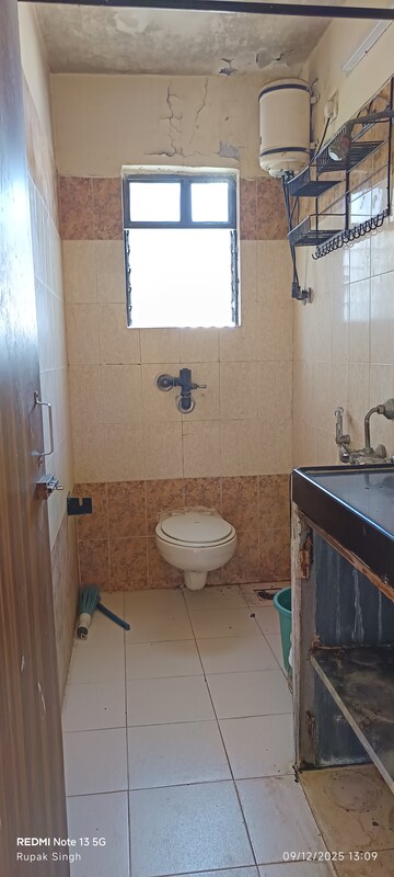 Bathroom in 2 BHK Apartment at Silver Arch Eden woods, Andheri West – for Rent