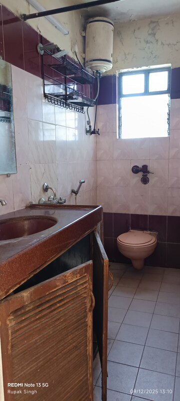 Bathroom in 2 BHK Apartment at Silver Arch Eden woods, Andheri West – for Rent
