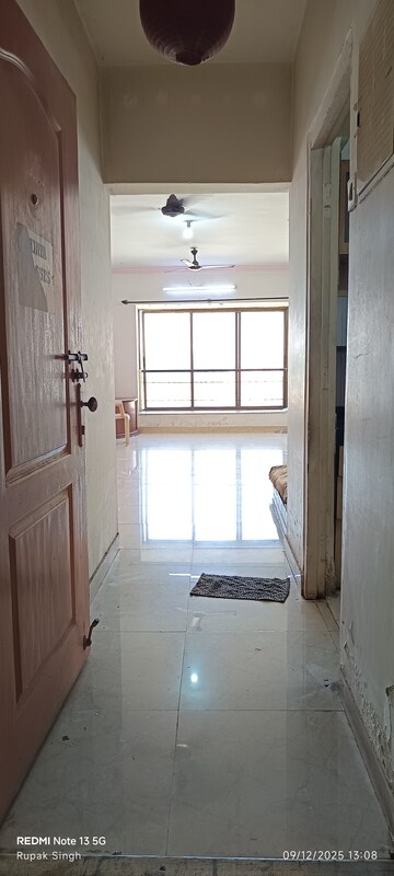 Living Room in 2 BHK Apartment at Silver Arch Eden woods, Andheri West – for Rent