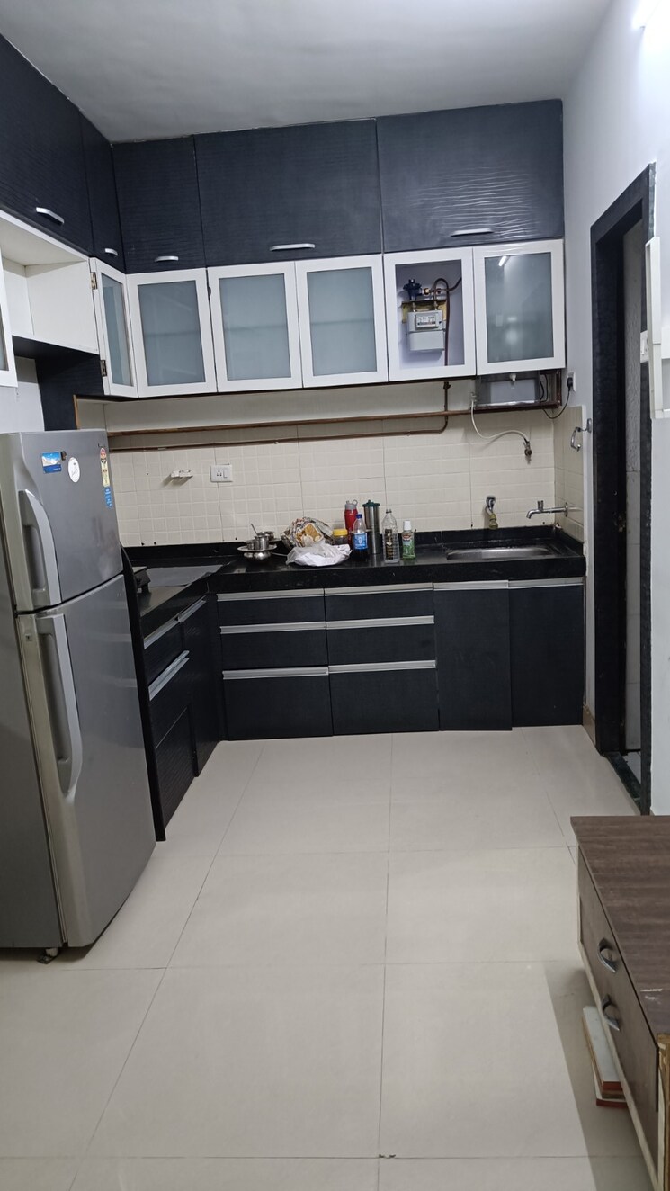 Kitchen, aishwaryam-greens-co-operative-housing-society 2 Bedroom 841 Sq.Ft. Apartment In Wakad Pune 9600308