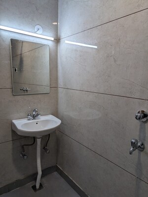Bathroom in 3 BHK Apartment at Dwarka – for Rent