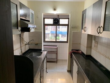 Kitchen in 2 BHK Apartment at RNA NG Suncity Phase III, Kandivali East – for Sale