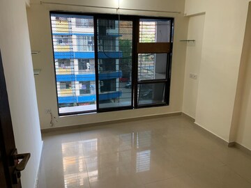 Room in 2 BHK Apartment at RNA NG Suncity Phase III, Kandivali East – for Sale