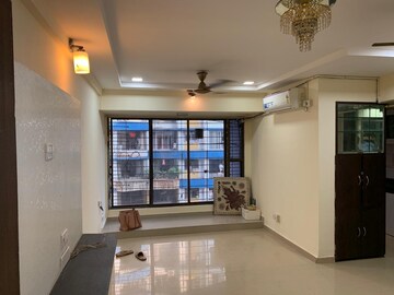 Living Room in 2 BHK Apartment at RNA NG Suncity Phase III, Kandivali East – for Sale