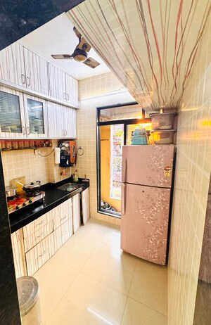 Kitchen in 2 BHK Apartment at Ganesh Darshan CHS Kopar Khairane, Kopar Khairane – for Sale