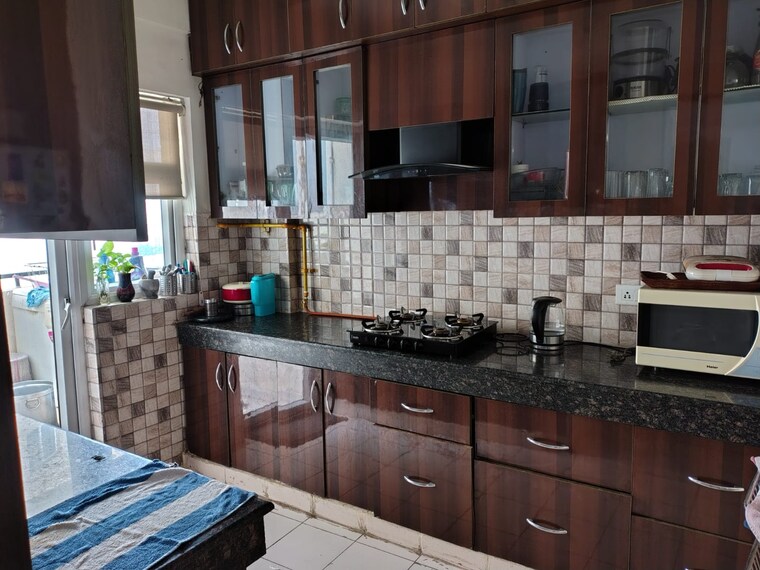 Kitchen, emaar-palm-gardens 3 Bedroom 1900 Sq.Ft. Apartment In Sector 83 Gurgaon 9601013