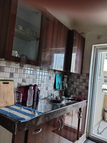 Kitchen in 3 BHK Apartment at Emaar Palm Gardens, Sector 83 – for Sale