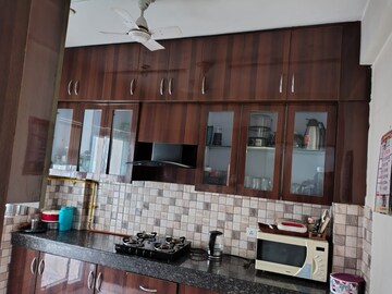 Kitchen in 3 BHK Apartment at Emaar Palm Gardens, Sector 83 – for Sale
