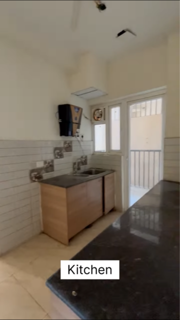 Kitchen in 2 BHK Apartment at Gaur Yamuna City 16th Park View, Sector 19 Yamuna Expressway – for Rent