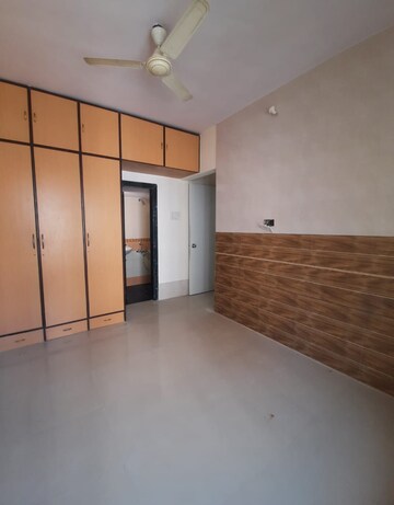 Master Bedroom in 1 BHK Apartment at Atul Blue Oasis, Kandivali West – for Sale