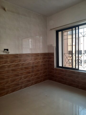 Master Bedroom in 1 BHK Apartment at Atul Blue Oasis, Kandivali West – for Sale