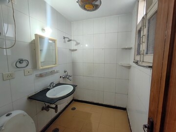 Bathroom in 3 BHK Apartment at CGHS HEWO Apartments, Sector 56 – for Rent