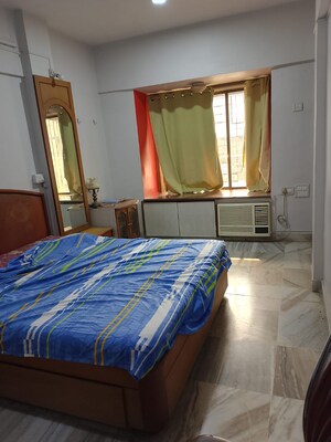Bedroom in 2 BHK Apartment at Vikas Park CHS, Malad West – for Rent